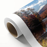 A serene Vermont landscape on rolled canvas, featuring muted green and blue tones.