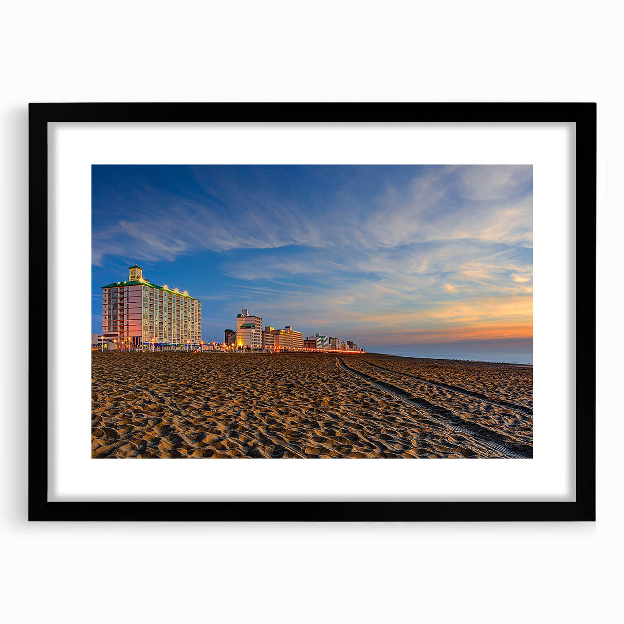Abstract art print featuring vibrant, textured colors on a black framed canvas, ideal for living room decor.