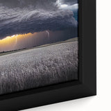 Close-up of black wall art featuring a textured, colorful depiction of the Palouse scenery on a framed canvas.
