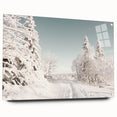 Large abstract wall art depicting winter season in muted blue and white tones on acrylic glass.