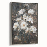Framed canvas artwork showcasing abstract floral designs in vibrant colors, set in a sleek silver frame, ideal for modern home decor.