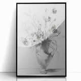 Framed acrylic artwork displaying an abstract floral design with vibrant colors, set against a sleek black frame, ideal for modern home decor.