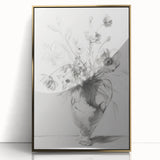 Framed acrylic artwork showcasing vibrant abstract florals in gold and pastel hues, elegantly presented in a sleek, modern frame for home décor enhancement.