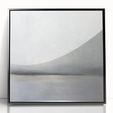Framed abstract landscape artwork in black acrylic, showcasing a serene blend of soft blues and greens, perfect for modern home decor. Ideal for enhancing living spaces with a touch of sophistication.