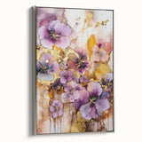 Framed canvas artwork showcasing abstract floral designs in vibrant colors, with a sleek silver frame, ideal for modern home decor and artistic aesthetics.
