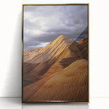 Framed acrylic artwork depicting a vibrant desert landscape with warm gold accents, showcasing a serene sunset and textured details for an elegant home decor touch.