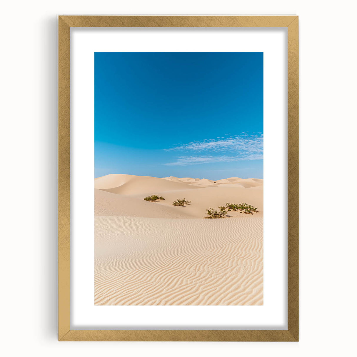 Elegant gold-framed landscape artwork featuring serene sand dunes, highlighted by a white mat, ideal for home decor. Perfect for enhancing any living space with a touch of nature.