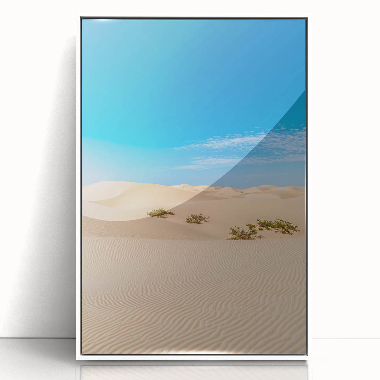 Framed acrylic artwork showcasing a serene desert landscape with soft golden dunes, set against a white background, ideal for modern home decor.