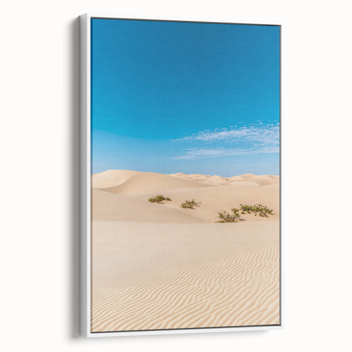 Framed canvas artwork depicting serene sand dunes in a desert landscape, showcasing soft beige and golden hues, perfect for modern home decor.