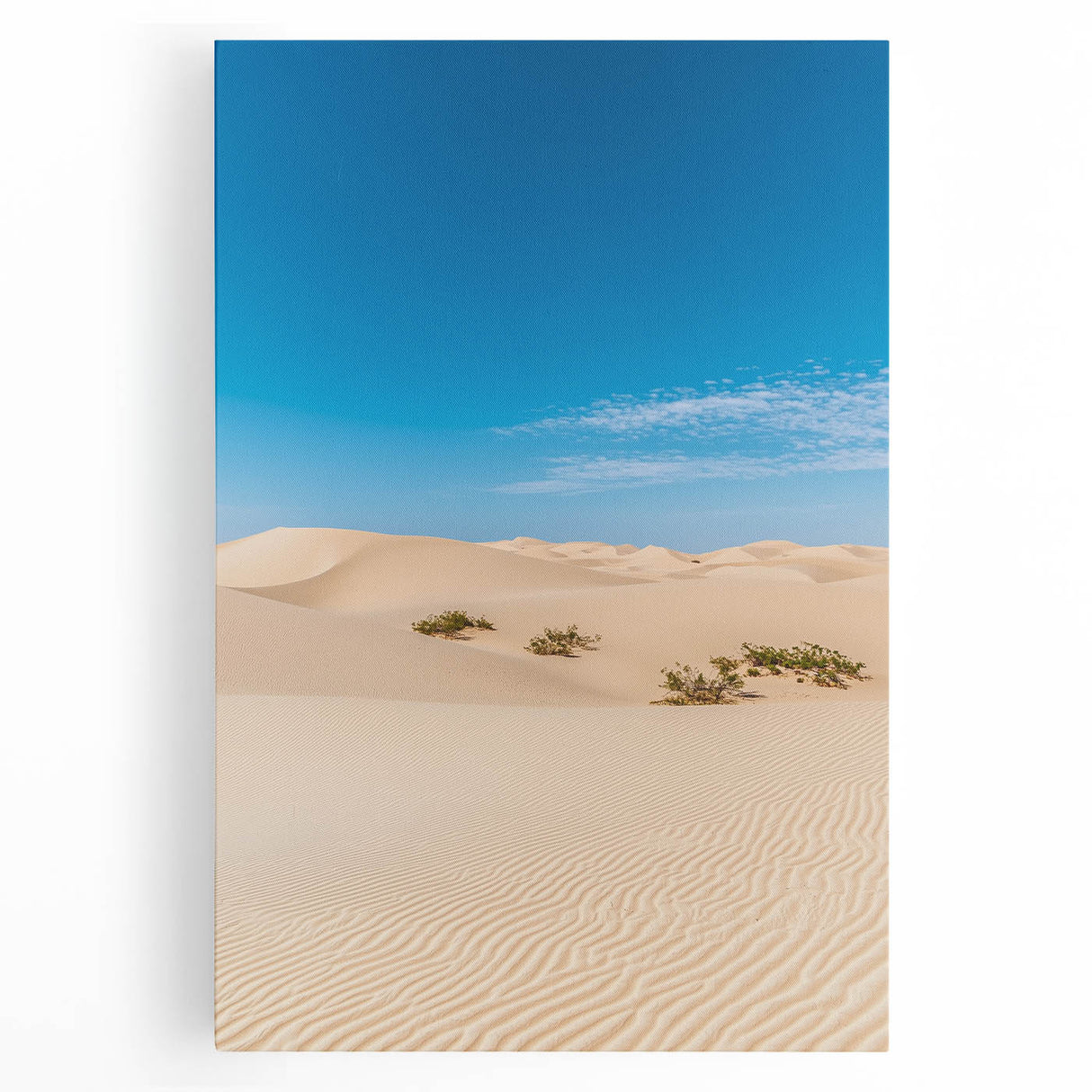 Vibrant stretched canvas artwork depicting a serene desert landscape with rolling sand dunes under a bright blue sky, ideal for enhancing modern decor.