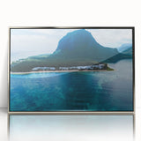 Acrylic print of a Mauritian landscape in silver frame, featuring soft blue and green tones.
