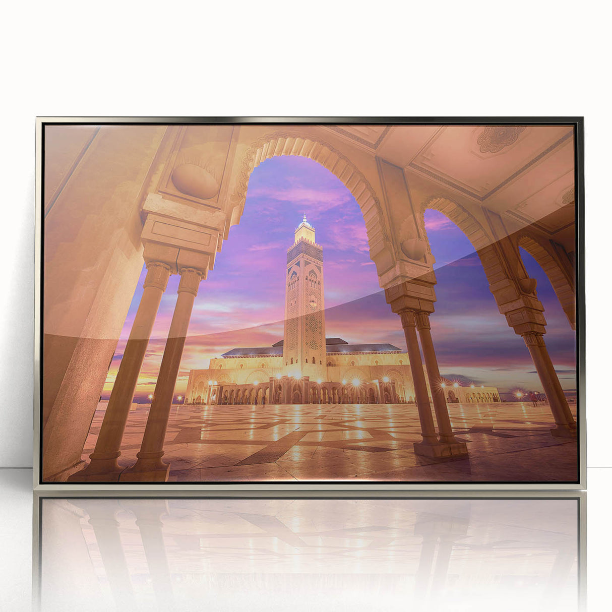 Art Deco style poster featuring a Moroccan landscape in muted earth tones on a silver-framed acrylic print.