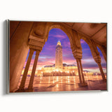 Vintage poster art depicting a Moroccan landscape on a large framed canvas, featuring vibrant earth tones.