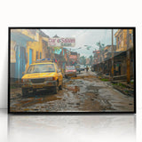 Large abstract wall art depicting a Tanzanian landscape in muted earth tones, framed in black acrylic.