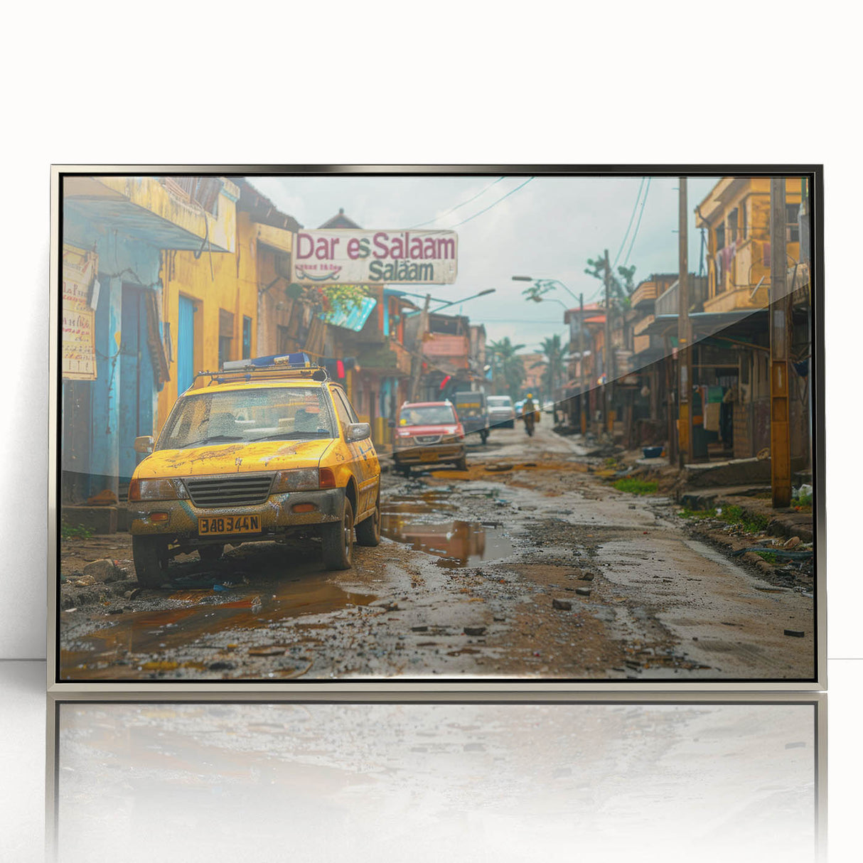 Mid-century modernist art depicting Tanzania scenery in muted earth tones on a silver-framed acrylic print.