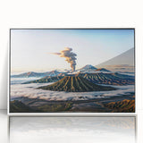 Acrylic print of a serene Indonesian landscape in muted greens and blues, framed in white.