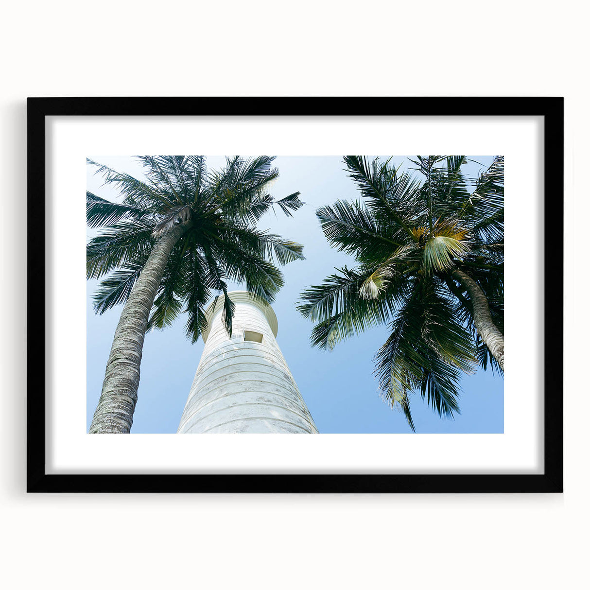 Abstract art print featuring vibrant, textured colors of Sri Lankan scenery on a framed black mat.