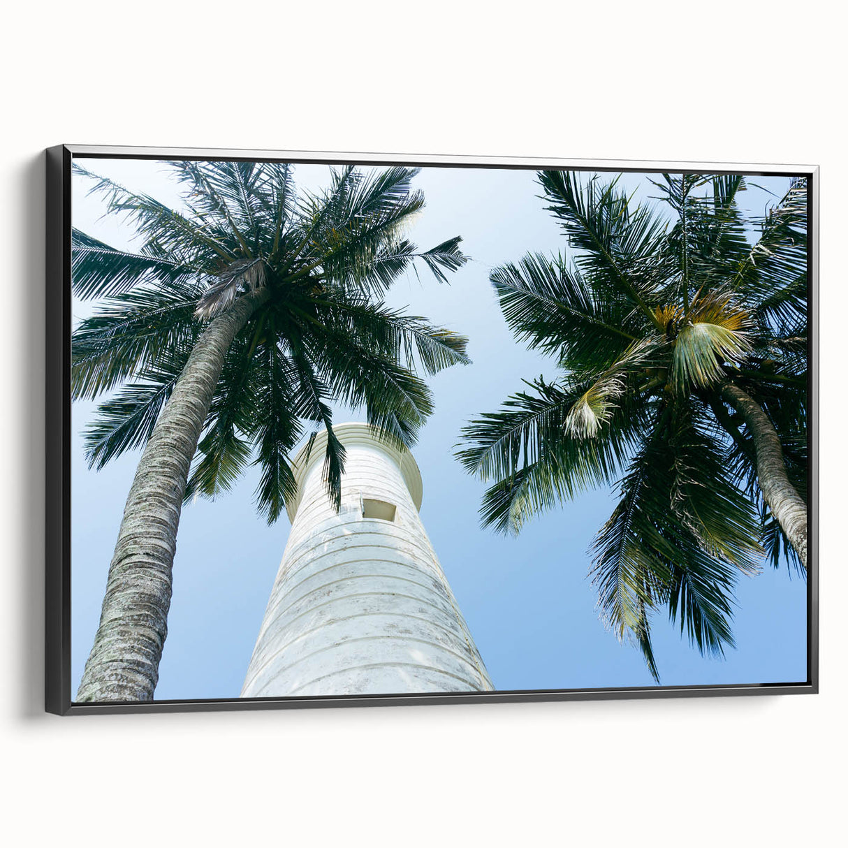 Black and white framed canvas featuring a vintage-style landscape painting of Sri Lankan scenery, ideal for bedroom decor.