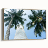 Framed canvas featuring a vintage-style landscape painting of a serene Sri Lankan scenery in muted gold and black tones.