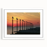 Textured abstract art print depicting a European scenery in muted earth tones on a framed white mat.