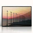 Large abstract wall art depicting a European scenery in muted earth tones on a framed acrylic.