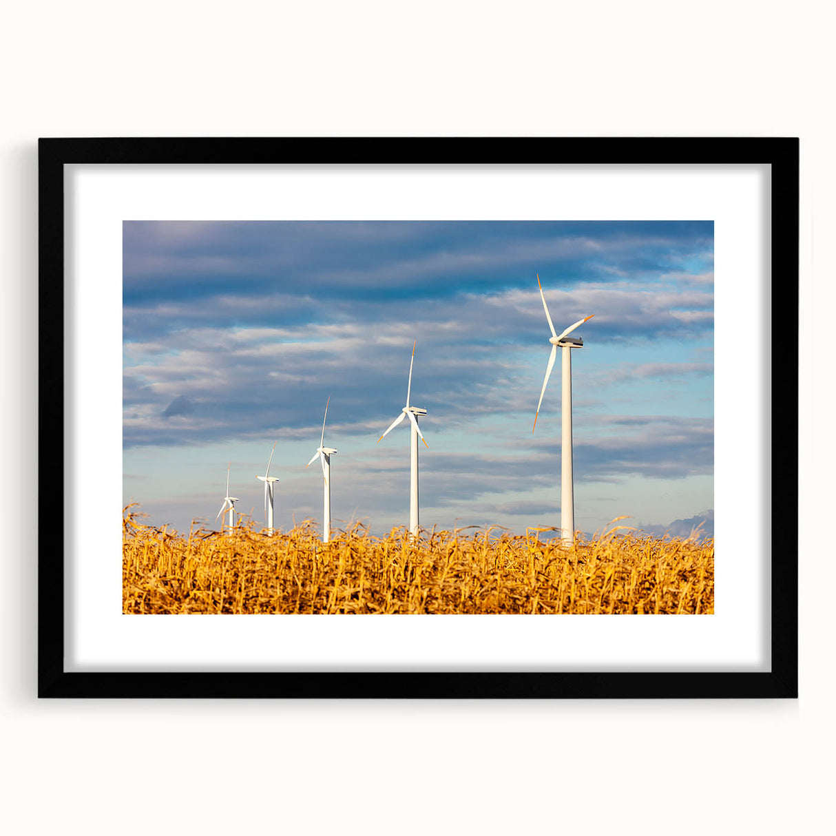 Abstract art print of colorful, textured scenery depicting a European landscape on a large framed canvas.