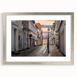 Extra large abstract art print of a textured European scenery in muted colors, framed in silver, ideal for living room decor.