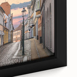 Extra large black wall art featuring a textured depiction of a European scenery in vibrant colors on framed canvas.