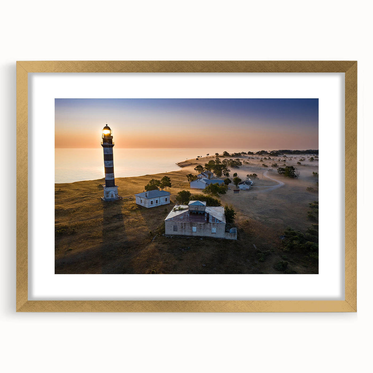 Abstract art print of a European landscape in muted earth tones, framed in gold, ideal for dining room decor.