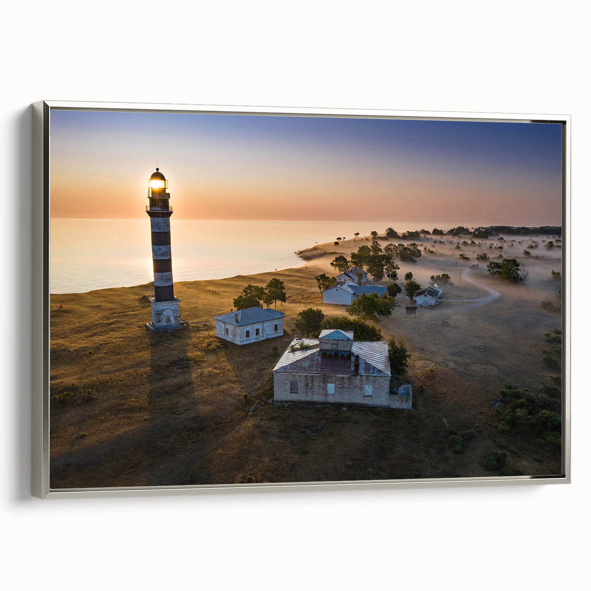 Framed canvas of a vintage-style landscape painting depicting a serene Estonian scenery in muted earth tones.
