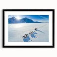 Extra large abstract art print featuring a textured, colorful Greenland scenery in a black frame with mat.