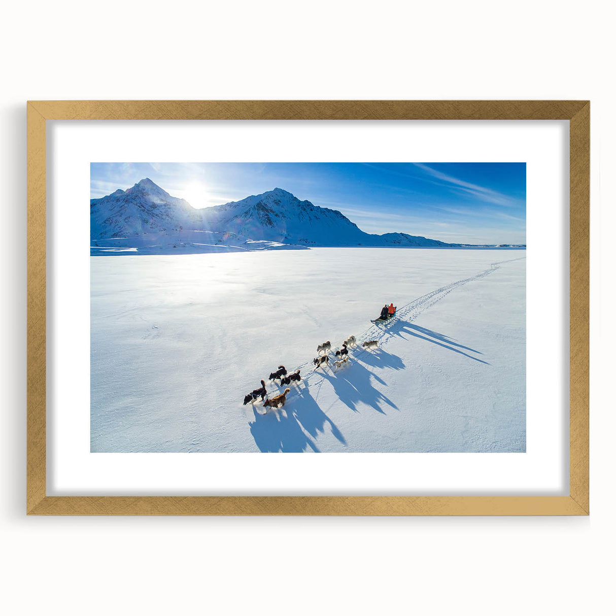 Abstract art print of a Greenland landscape in muted green and blue tones, framed in gold, ideal for dining room decor.