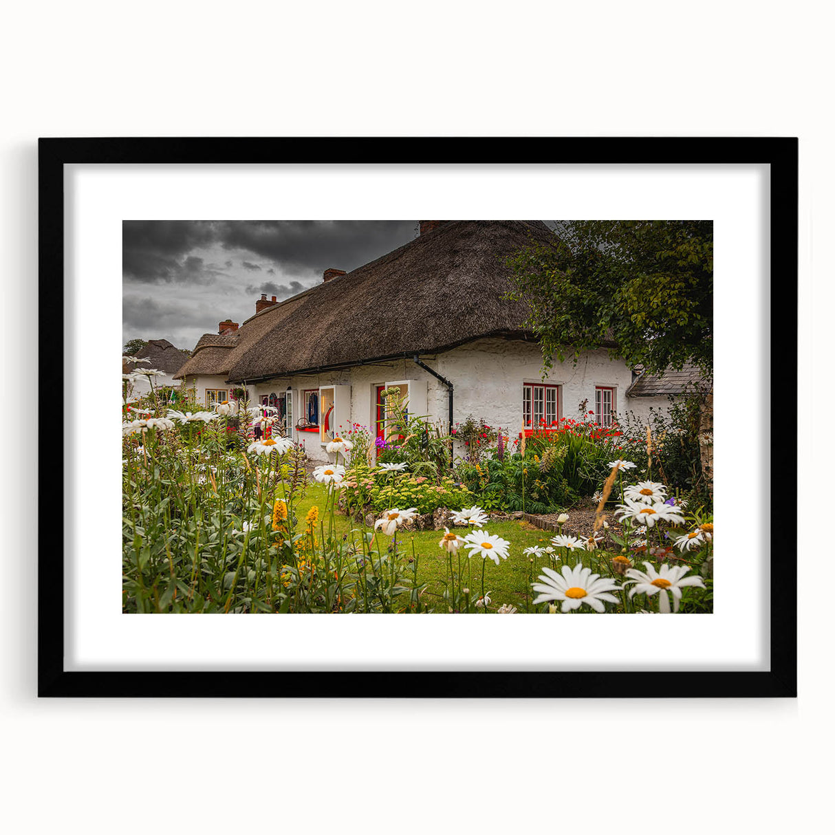 Extra large textured abstract art print of a colorful Irish landscape on a black-framed canvas.