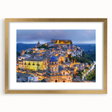 Abstract art print of a Sicilian landscape in muted earth tones on a framed canvas, suitable for dining room decor.