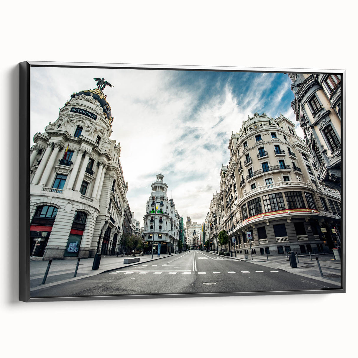 Black and white framed canvas of Madrid landscape, ideal for bedroom wall decor.