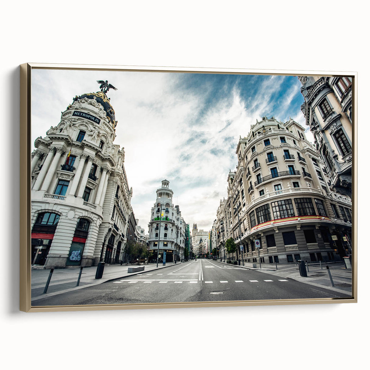 Framed canvas featuring a vintage-style landscape painting of Madrid with a gold frame, ideal for bedroom wall art.