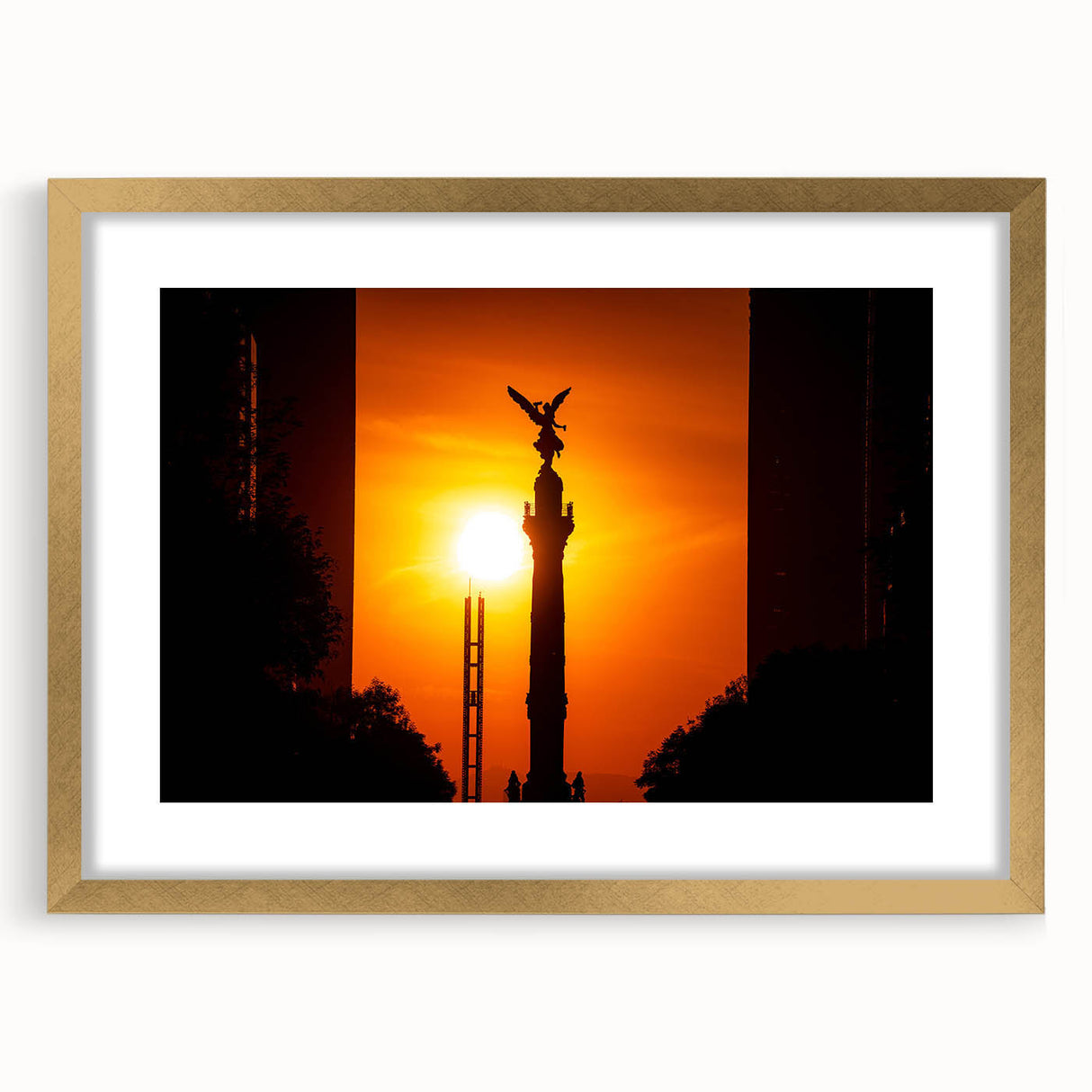 Abstract art print of Mexico City in textured colors of orange and blue, framed in gold, ideal for living room decor.