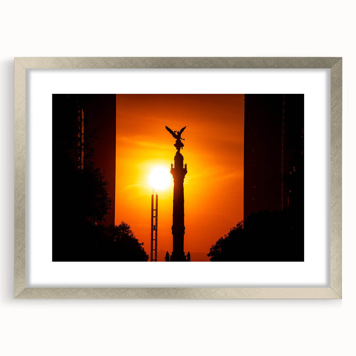 Textured art print of an abstract Mexico City skyline in muted earth tones, framed in silver, ideal for bedroom decor.