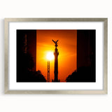 Textured art print of an abstract Mexico City skyline in muted earth tones, framed in silver, ideal for bedroom decor.