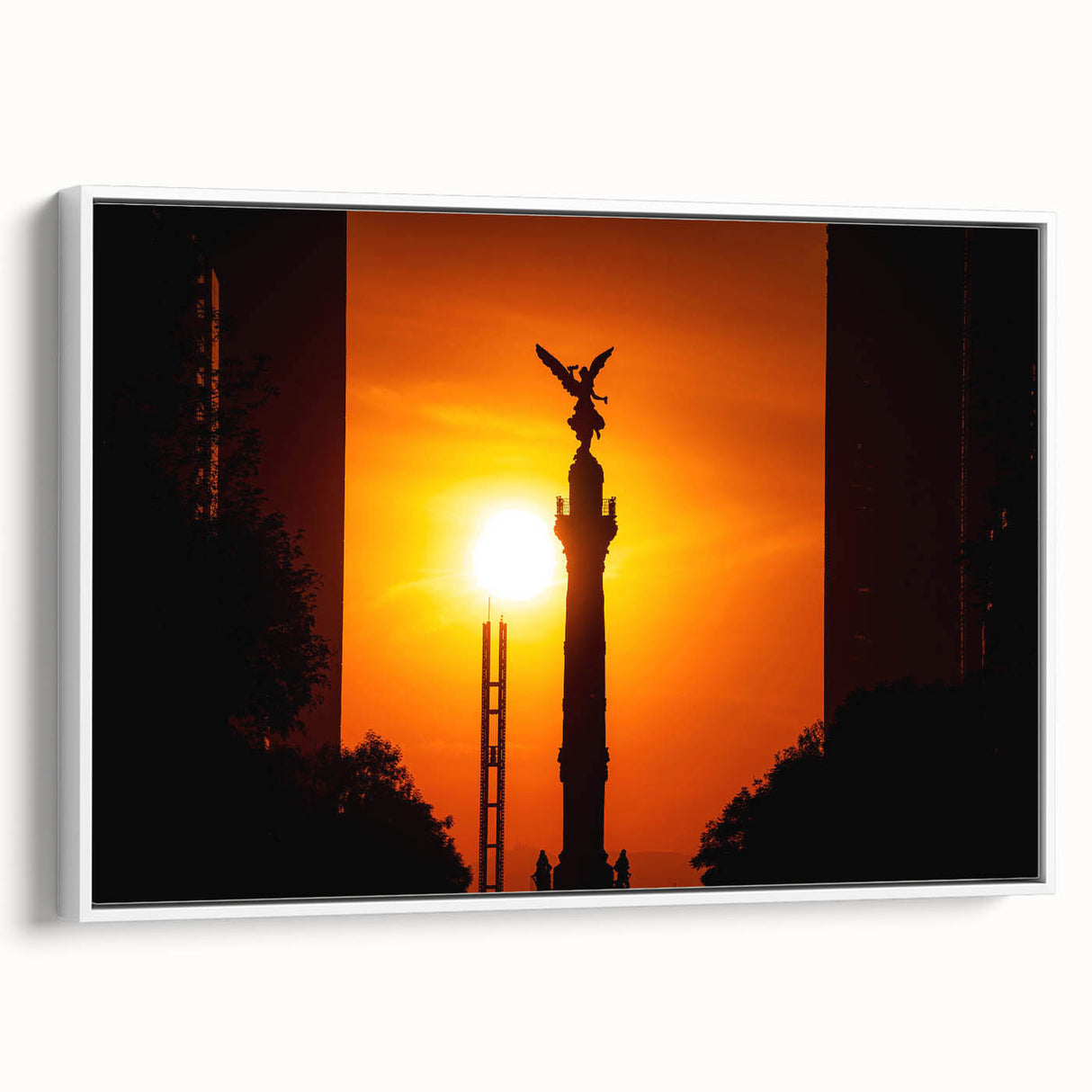 Vintage poster art of Mexico City on a framed canvas, featuring colorful buildings and black sky.
