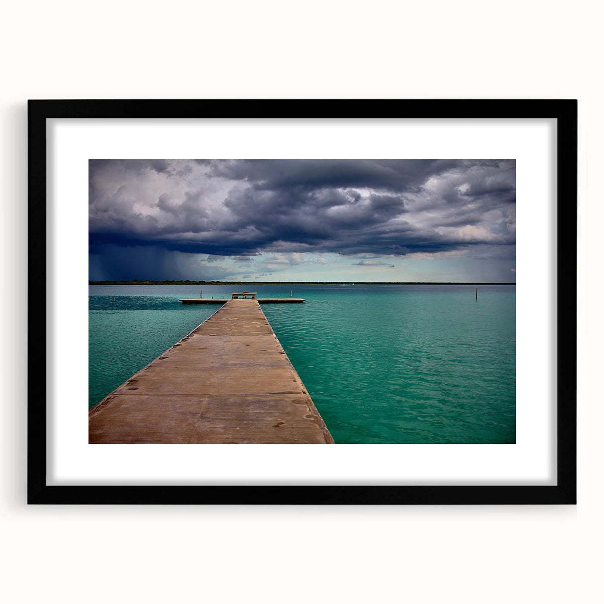 Colorful abstract art print depicting a vibrant, textured scenery of Quintana Roo, in a black frame with mat.