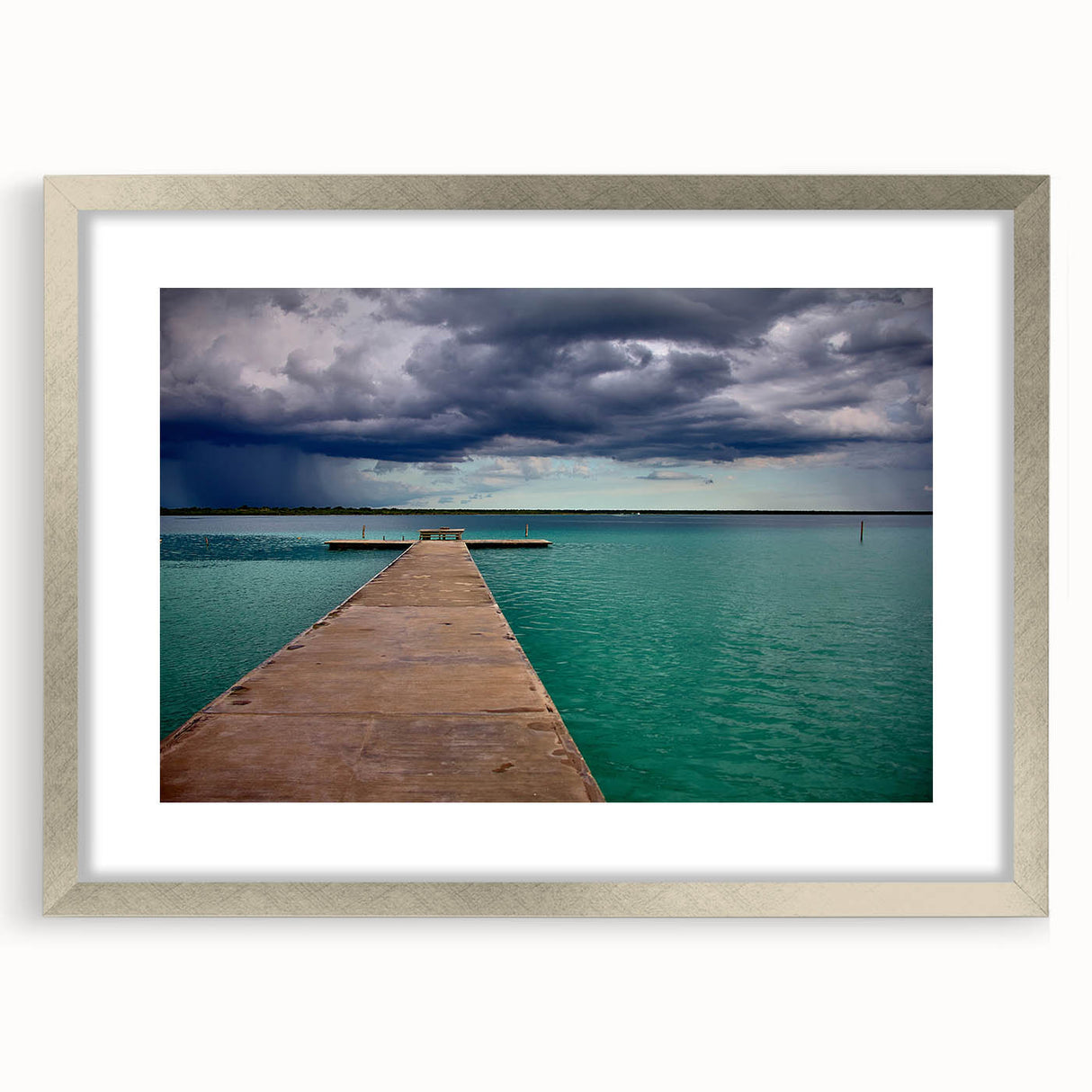Textured abstract art print of Quintana Roo scenery in muted earth tones, framed in silver, suitable for bedroom decor.