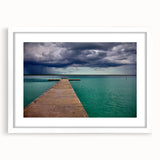 Abstract art print of Quintana Roo scenery in muted blue and green tones, framed with a white mat.
