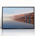 Large abstract wall art depicting a Middle Eastern scenery in muted earth tones on a framed acrylic.