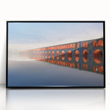 Large abstract wall art depicting a Middle Eastern scenery in muted earth tones on a framed acrylic.