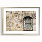 Textured abstract art print of Tel Aviv skyline in muted earth tones on a framed silver mat, suitable for bedroom art.