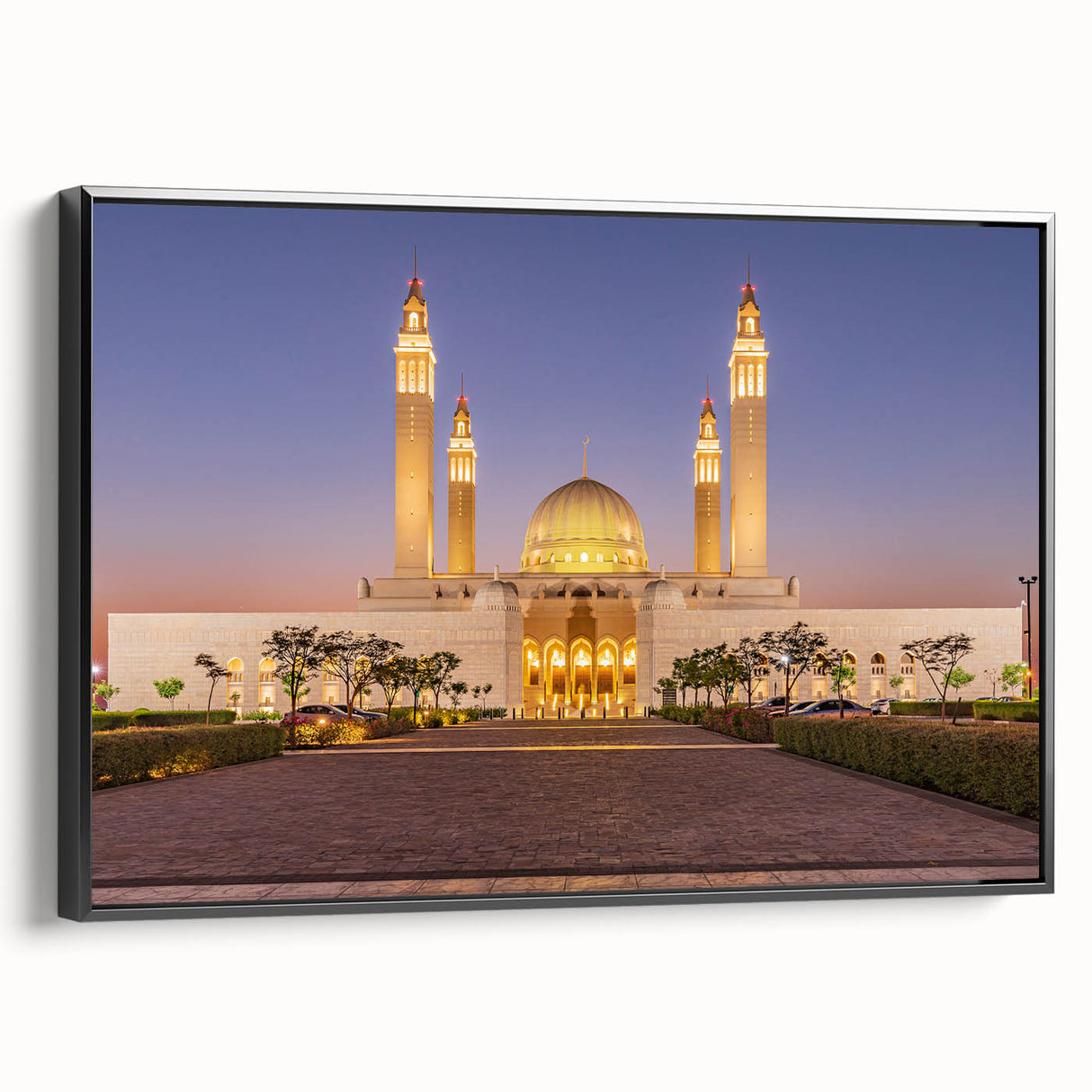 Black and white framed canvas featuring a vintage landscape painting of Oman, ideal for bedroom decor.
