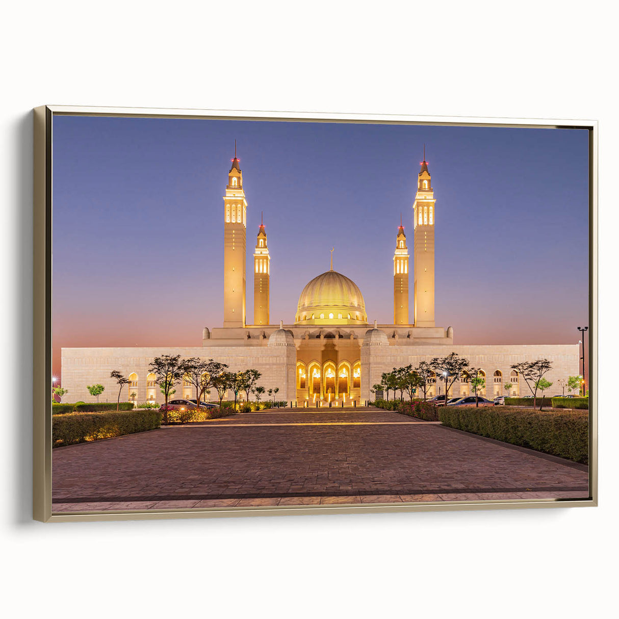 Framed canvas depicting a vintage-style landscape of Oman in muted gold and black tones, ideal for bedroom wall art.
