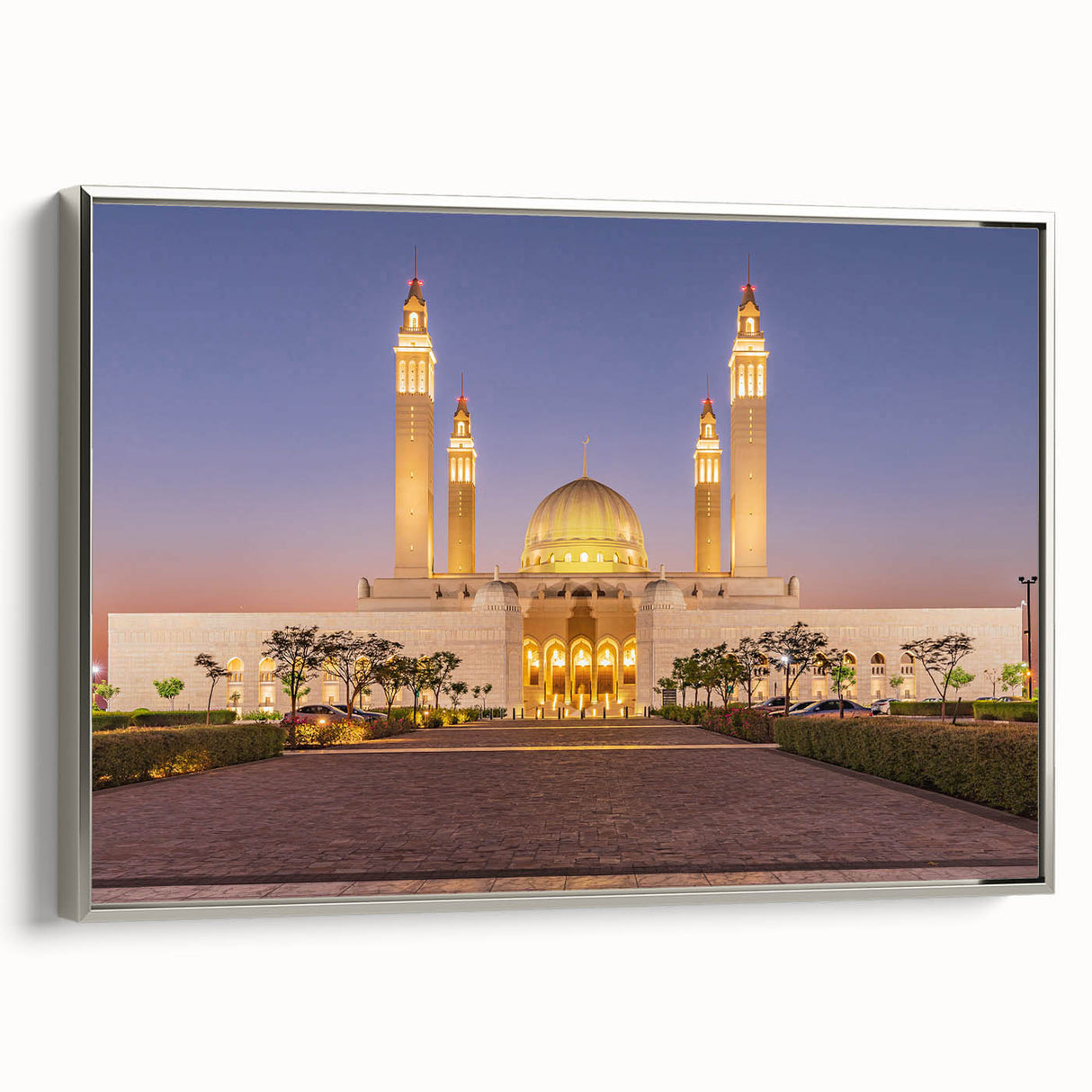 Framed canvas featuring a vintage-style landscape painting of a Middle Eastern scene in vibrant colors.