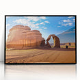 Large abstract wall art depicting Saudi Arabian scenery in muted earth tones, framed in black acrylic.
